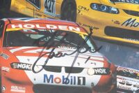 HOLDEN MOTORSPORT: A 2002 Holden Motorsport wall poster showcasing the 2002 Holden entrants in various competitions, signed by Mark Skaife, 58cm high, 41.5cm wide - 2