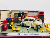 FIAT: A 1:43 scale model diorama by Mini-Rama with a Fiat Abarth 850TC, in plastic display case [Location: Sydney]