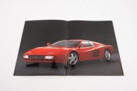 FERRARI 512 TR: A 1993 dated Ferrari 512 TR sales brochure, on gloss stock paper with fold-out pages featuring photos & diagrams [Location: Melbourne] - 2