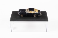 FERRARI 250 GT LUSSO: A CE Model 1:43 scale Ferrari 250 GT Lusso in black in perspex case [Location: Melbourne]