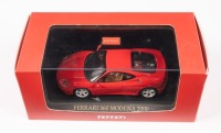 FERRARI 360 MODENA: An IXO Models 1:43 scale 2000 Ferrari 360 Modena in red, official Ferrari product in original box [Location: Melbourne]