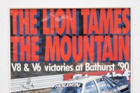 BATHURST 1990: A large laminated Bathurst 1990 Poster 'The Lion Tames The Mountain - V8 & V6 Victories at Bathurst 90' personally signed and inscribed 'To Mike' by Win Percy, measures 140cm high, 97cm wide. - 4