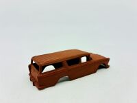 DINKY: Twelve unpainted car and truck bodies, believed to be Dinky. [Location: Sydney] - 5