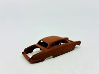 DINKY: Twelve unpainted car and truck bodies, believed to be Dinky. [Location: Sydney] - 9