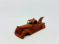 DINKY: Twelve unpainted car and truck bodies, believed to be Dinky. [Location: Sydney] - 10