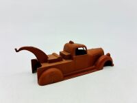 DINKY: Twelve unpainted car and truck bodies, believed to be Dinky. [Location: Sydney] - 11