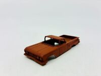 DINKY: Twelve unpainted car and truck bodies, believed to be Dinky. [Location: Sydney] - 14