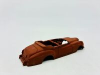 DINKY: Twelve unpainted car and truck bodies, believed to be Dinky. [Location: Sydney] - 19