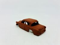 DINKY: Twelve unpainted car and truck bodies, believed to be Dinky. [Location: Sydney] - 21
