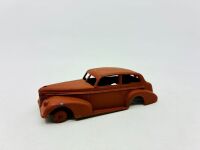 DINKY: Twelve unpainted car and truck bodies, believed to be Dinky. [Location: Sydney] - 22