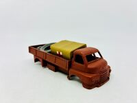 DINKY: Twelve unpainted car and truck bodies, believed to be Dinky. [Location: Sydney] - 24