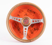 ASH TRAY: An MG themed ash tray, with wooden rimmed MG steering wheel above orange ceramic base, 5cm high, 19cm diameter - 2
