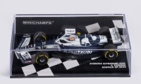 SCUDERIA ALPHATAURI: A Minichamps 1:43 scale Scuderia Alphatauri AT03, raced by Yuki Tsunoda, Bahrain GP 2022