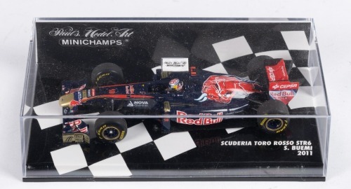 403 · SCUDERIA TORO ROSSO: A Minichamps 1:43 scale Scuderia Toro Rosso STR6, as raced by Buemi during the 2011 Formula 1 season