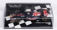 SCUDERIA TORO ROSSO: A Minichamps 1:43 scale Scuderia Toro Rosso STR6, as raced by Buemi during the 2011 Formula 1 season