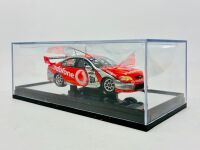 FORD: A 1:43 scale model by Classic Carlectables of the #888 Team Vodafone Ford BF Falcon driven by Craig Lowndes in the 2007 V8 Supercars season, limited edition 0133/2750, complete with certificate of authenticity [Location: Sydney] - 7