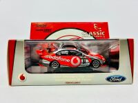 FORD: A 1:43 scale model by Classic Carlectables of the #88 Team Vodafone Ford BF Falcon driven by Jamie Whincup in the 2008 V8 Supercars season, limited edition 0115/1500, complete with certificate of authenticity [Location: Sydney] - 9