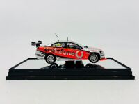 HOLDEN: A 1:43 scale model by Classic Carlectables of the #888 Team Vodafone Holden VE Commodore driven by Craig Lowndes in the 2010 V8 Supercars season, limited edition 0119/1600, complete with certificate of authenticity [Location: Sydney] - 2