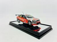 HOLDEN: A 1:43 scale model by Classic Carlectables of the #888 Team Vodafone Holden VE Commodore driven by Craig Lowndes in the 2010 V8 Supercars season, limited edition 0119/1600, complete with certificate of authenticity [Location: Sydney] - 3