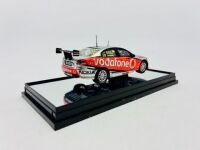 HOLDEN: A 1:43 scale model by Classic Carlectables of the #888 Team Vodafone Holden VE Commodore driven by Craig Lowndes in the 2010 V8 Supercars season, limited edition 0119/1600, complete with certificate of authenticity [Location: Sydney] - 4
