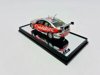 HOLDEN: A 1:43 scale model by Classic Carlectables of the #888 Team Vodafone Holden VE Commodore driven by Craig Lowndes in the 2010 V8 Supercars season, limited edition 0119/1600, complete with certificate of authenticity [Location: Sydney] - 5