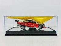 HOLDEN: A 1:43 scale model by Classic Carlectables of the #888 Team Vodafone Holden VE Commodore driven by Craig Lowndes in the 2010 V8 Supercars season, limited edition 0119/1600, complete with certificate of authenticity [Location: Sydney] - 6