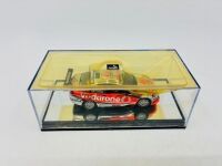 HOLDEN: A 1:43 scale model by Classic Carlectables of the #888 Team Vodafone Holden VE Commodore driven by Craig Lowndes in the 2010 V8 Supercars season, limited edition 0119/1600, complete with certificate of authenticity [Location: Sydney] - 7