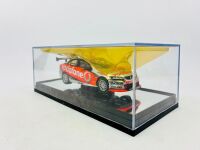 HOLDEN: A 1:43 scale model by Classic Carlectables of the #888 Team Vodafone Holden VE Commodore driven by Craig Lowndes in the 2010 V8 Supercars season, limited edition 0119/1600, complete with certificate of authenticity [Location: Sydney] - 8