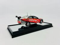 HOLDEN: A 1:43 scale model by Classic Carlectables of the #1 Team Vodafone Holden VE Commodore driven by Jamie Whincup in the 2010 V8 Supercars season, limited edition 0119/1600, complete with certificate of authenticity [Location: Sydney] - 4