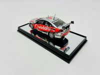 HOLDEN: A 1:43 scale model by Classic Carlectables of the #1 Team Vodafone Holden VE Commodore driven by Jamie Whincup in the 2010 V8 Supercars season, limited edition 0119/1600, complete with certificate of authenticity [Location: Sydney] - 5