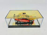 HOLDEN: A 1:43 scale model by Classic Carlectables of the #1 Team Vodafone Holden VE Commodore driven by Jamie Whincup in the 2010 V8 Supercars season, limited edition 0119/1600, complete with certificate of authenticity [Location: Sydney] - 7