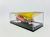 HOLDEN: A 1:43 scale model by Classic Carlectables of the #1 Team Vodafone Holden VE Commodore driven by Jamie Whincup in the 2010 V8 Supercars season, limited edition 0119/1600, complete with certificate of authenticity [Location: Sydney] - 8