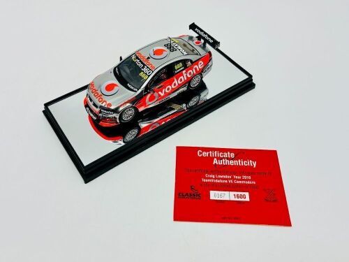 7 · HOLDEN: A 1:43 scale model by Classic Carlectables of the #888 Team Vodafone Holden VE Commodore driven by Craig Lowndes in the 2010 V8 Supercars season, limited edition 0167/1600, complete with certificate of authenticity [Location: Sydney]