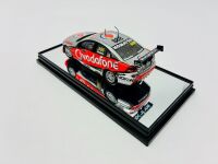 HOLDEN: A 1:43 scale model by Classic Carlectables of the #888 Team Vodafone Holden VE Commodore driven by Craig Lowndes in the 2010 V8 Supercars season, limited edition 0167/1600, complete with certificate of authenticity [Location: Sydney] - 5