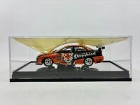 HOLDEN: A 1:43 scale model by Classic Carlectables of the #23 Tasman Motorsport Holden VZ Commodore driven by Andrew Jones in the 2006 V8 Supercars season, limited edition 171/700, complete with certificate of authenticity [Location: Sydney] - 7