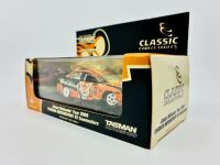 HOLDEN: A 1:43 scale model by Classic Carlectables of the #3 Tasman Motorsport Holden VZ Commodore driven by Jason Richards in the 2006 V8 Supercars season, limited edition 0520/900, complete with certificate of authenticity [Location: Sydney] - 10
