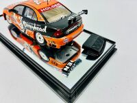 HOLDEN: A 1:43 scale model by Classic Carlectables of the #23 Tasman Motorsport Holden VZ Commodore driven by Andrew Jones in the 2006 V8 Supercars season, limited edition 173/700, complete with certificate of authenticity [Location: Sydney] - 6