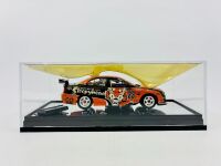 HOLDEN: A 1:43 scale model by Classic Carlectables of the #23 Tasman Motorsport Holden VZ Commodore driven by Andrew Jones in the 2006 V8 Supercars season, limited edition 173/700, complete with certificate of authenticity [Location: Sydney] - 7
