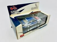 FORD: A 1:43 scale model by Classic Carlectables of the #5 FPR Ford BA Falcon driven by Glenn Seton in the 2003 V8 Supercars season, limited edition 0067/2000, complete with certificate of authenticity [Location: Sydney] - 10
