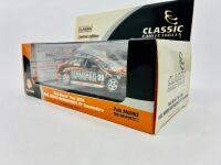 HOLDEN: A 1:43 scale model by Classic Carlectables of the #29 Paul Morris Motorsport Holden VY Commodore driven by Paul Morris in the 2004 V8 Supercars season, limited edition 0686/1000, complete with certificate of authenticity [Location: Sydney] - 10