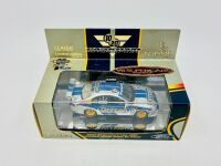 FORD: A 1:43 scale model by Classic Carlectables of the #10 Larkham Motor Sport Ford BA Falcon driven by Jason Bargwanna in the 2004 V8 Supercars season, limited edition 0772/1000, complete with certificate of authenticity [Location: Sydney] - 11