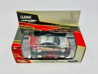 FORD: A 1:43 scale model by Classic Carlectables of the #31 Super Cheap Auto Racing Ford BA Falcon driven by Steve Ellery in the 2004 V8 Supercars season, limited edition 0885/1000, complete with certificate of authenticity [Location: Sydney] - 9