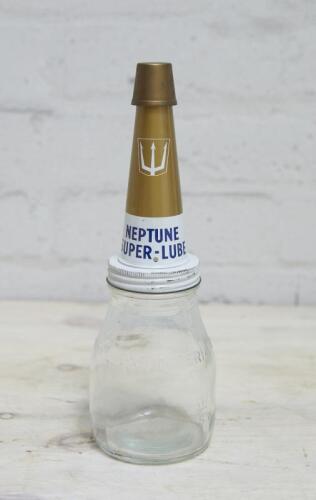 NEPTUNE: A one imperial pint oil bottle with Neptune Super Lube tin top and dust cap.