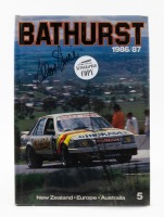 ALLAN GRICE: 'Bathurst - 1986/87' hardcover year book by Barry Naismith, signed to front cover by Allan Grice