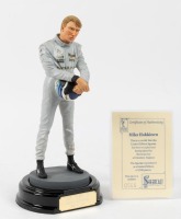HAKKINEN: A 1:9 scale limited edition (0565/2500) cold cast porcelain resin figure of Mika Hakkinen by Shercast of Cheshire, England, NIB and accompanied by a COA from The Art of Sport, approx 22cm high