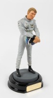 HAKKINEN: A 1:9 scale limited edition (0565/2500) cold cast porcelain resin figure of Mika Hakkinen by Shercast of Cheshire, England, NIB and accompanied by a COA from The Art of Sport, approx 22cm high - 2