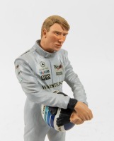 HAKKINEN: A 1:9 scale limited edition (0565/2500) cold cast porcelain resin figure of Mika Hakkinen by Shercast of Cheshire, England, NIB and accompanied by a COA from The Art of Sport, approx 22cm high - 3