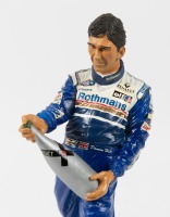 HILL: A 1:9 scale limited edition (0606/2500) cold cast porcelain resin figure of Damon Hill sculpted by Paul Szeiler for Endurance Ltd, on wooden base, NIB and accompanied by a COA from The Art of Sport, 22cm high - 6