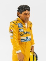SENNA: A 1:9 scale limited edition (3948/5000) cold cast porcelain resin figure of Ayrton Senna sculpted by Paul Szeiler for Endurance Ltd, on a wooden base with engraved plaque, NIB and accompanied by a COA from The Art of Sport, 23cm high - 3