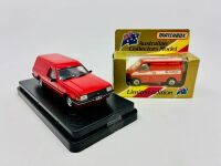 FORD: A 1:43 scale model by Trax of the Ford XD Falcon Panel Van and a 1:64 scale Ford Transit in Australia Post livery by Matchbox, both complete with original packaging [Location: Sydney]